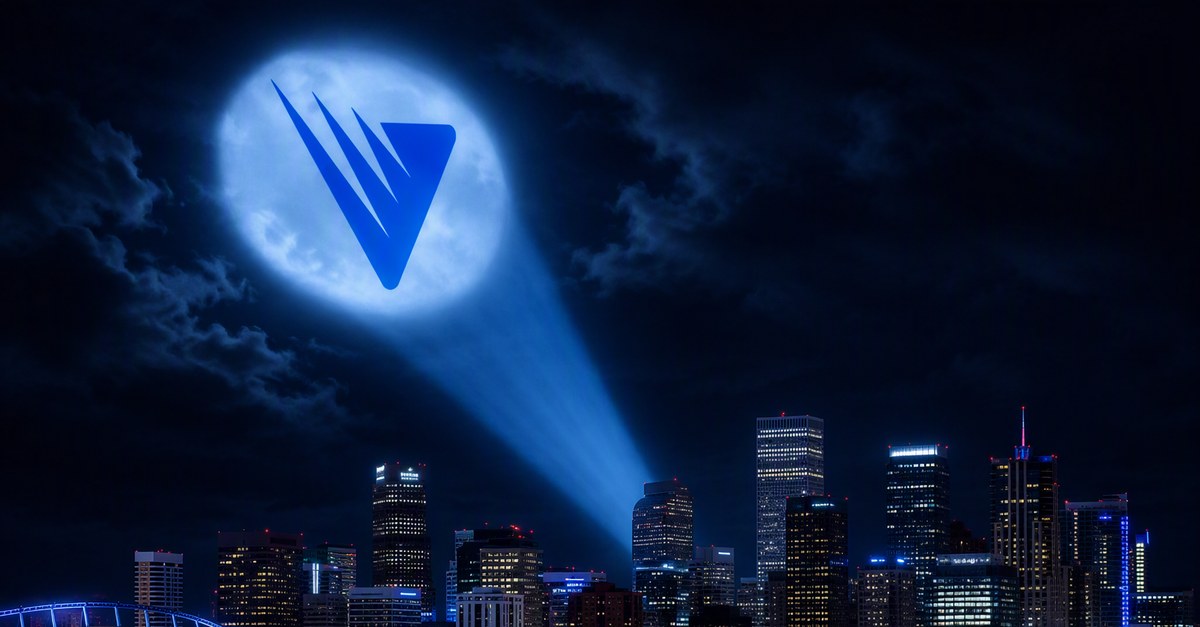 The Alconox logo projected as a searchlight signal onto the clouds above a city skyline at night